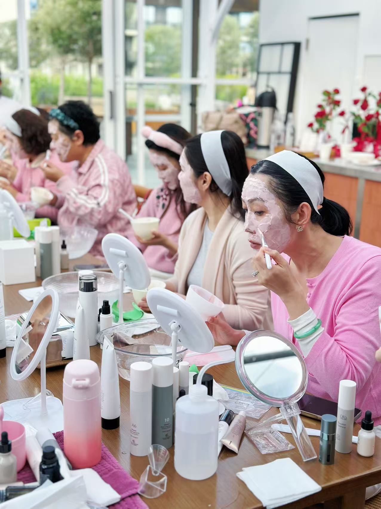 Pink cakes and decorations at facial party Melbourne